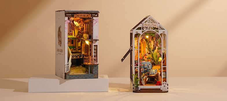 Rolife Sakura Densya Book Nook and Garden House Book Nook on the table