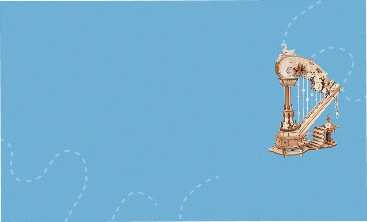 Pale blue horizontal banner background featuring a small wooden ROKR harp puzzle model in the bottom-right corner.