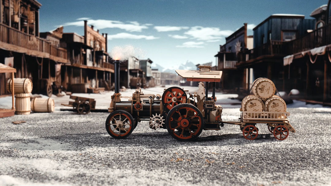 Robotime ROKR steam tractor 3D wooden puzzle model displayed on a dusty Western street scene with weathered storefronts in the background