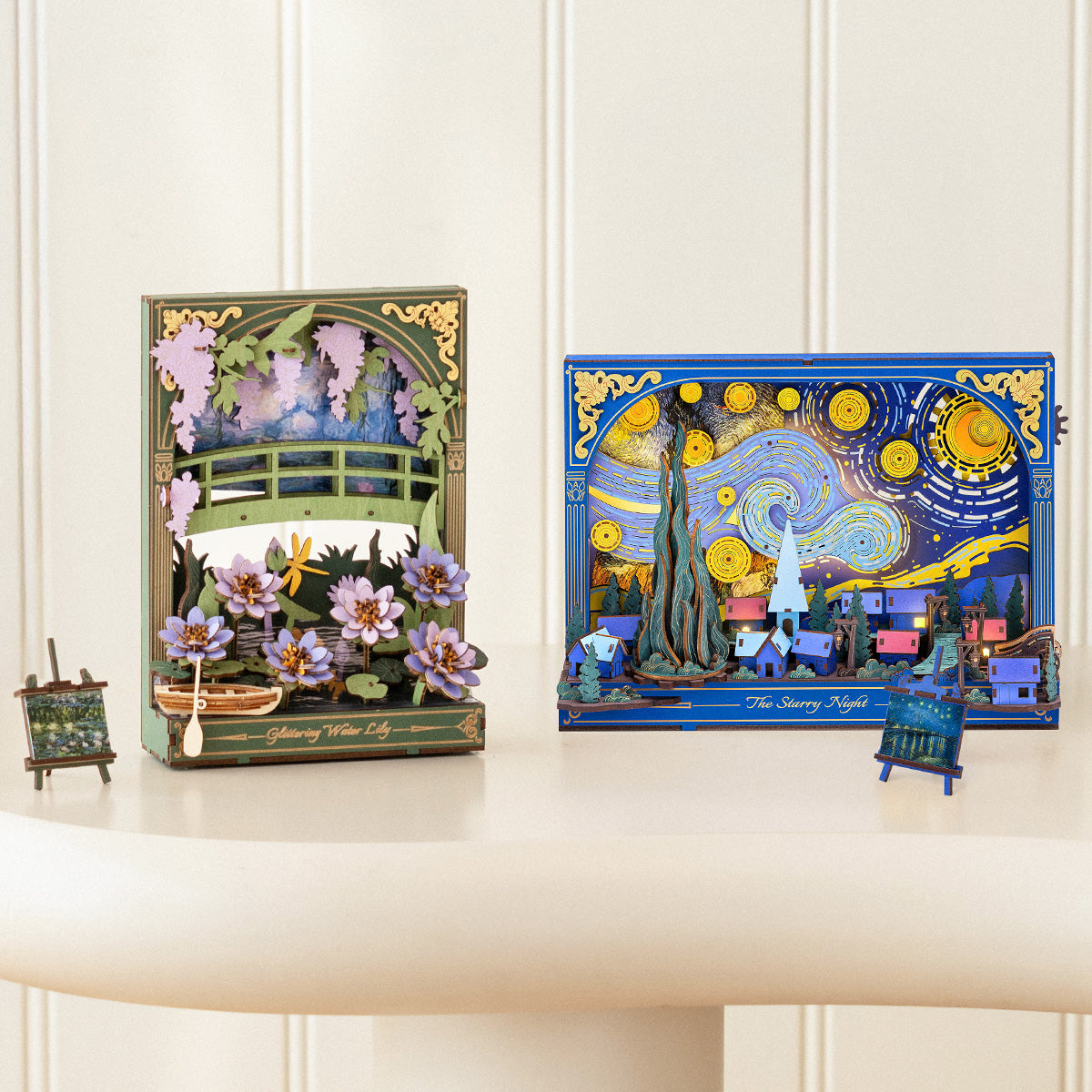 Rowood The Starry Night Wall Art 3D Wooden Puzzle TH003 paired with another Rowood art puzzle on a white surface, showing the blue Starry Night alongside an Impressionist water lily scene