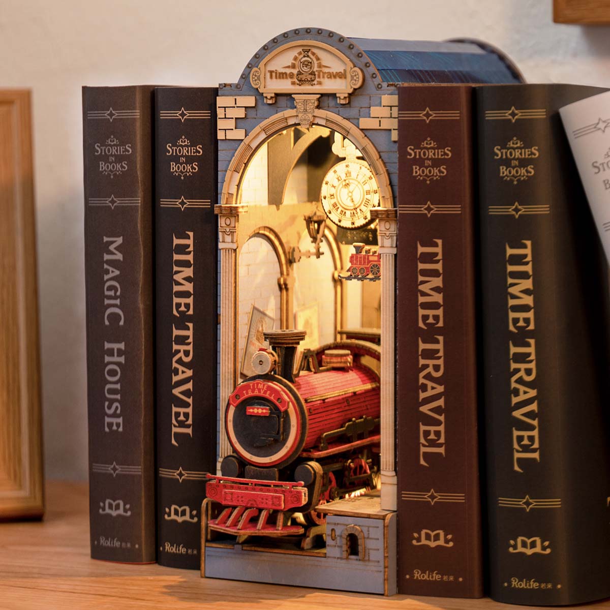 Rolife Stories in Books Series | Book Nook (4 Sets) DIY book nook miniature kit, interior cutaway showing inner mechanism