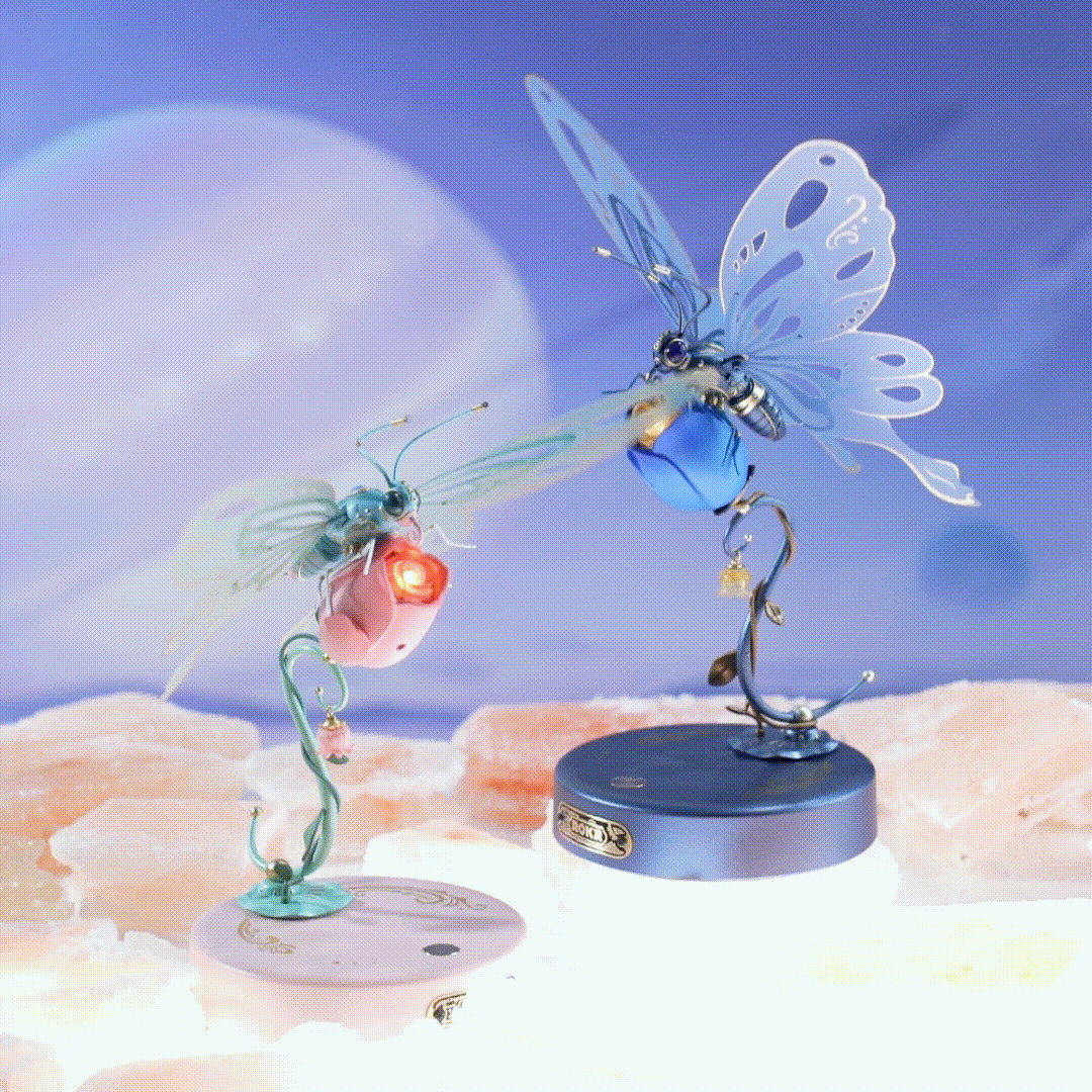 ROKR Butterfly mechanical puzzle set showing pink and blue variants side by side on a dreamy cosmic landscape background