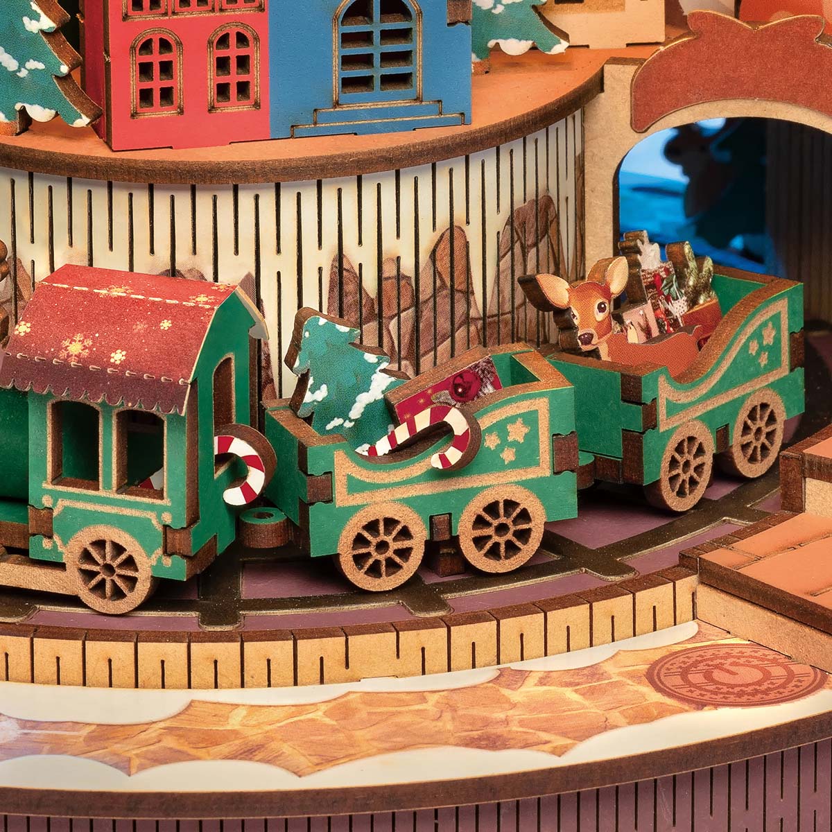 Rolife Christmas Melody Tree AMS01 angled view revealing layered branch tiers and central wooden trunk