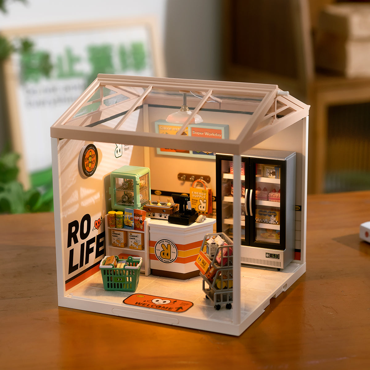Rolife Super Creator Energy Supply Store DW002 DIY book nook miniature kit, front view on a neutral background