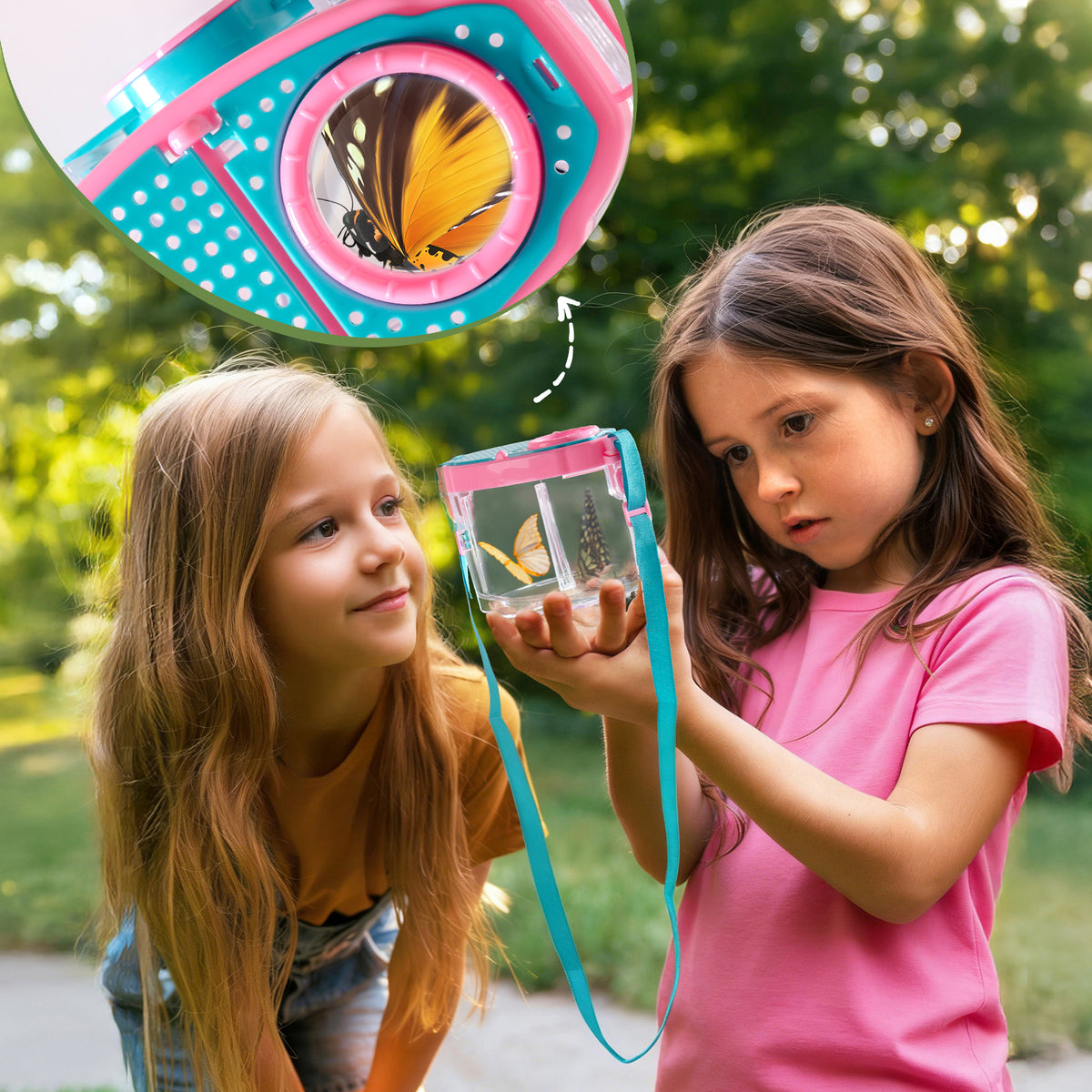 Two girls sitting on grass in forest using ROBUD pink and green outdoor explorer kits with nets and bug containers around them
