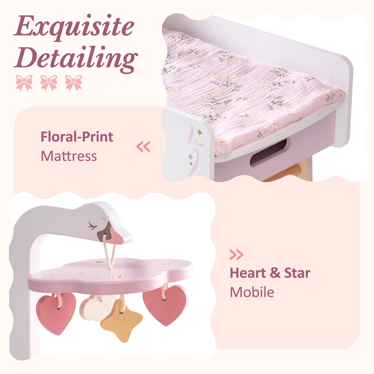 ROBUD pink doll changing table close-up detail showing floral-print mattress on platform and hanging heart and star mobile with pink accents