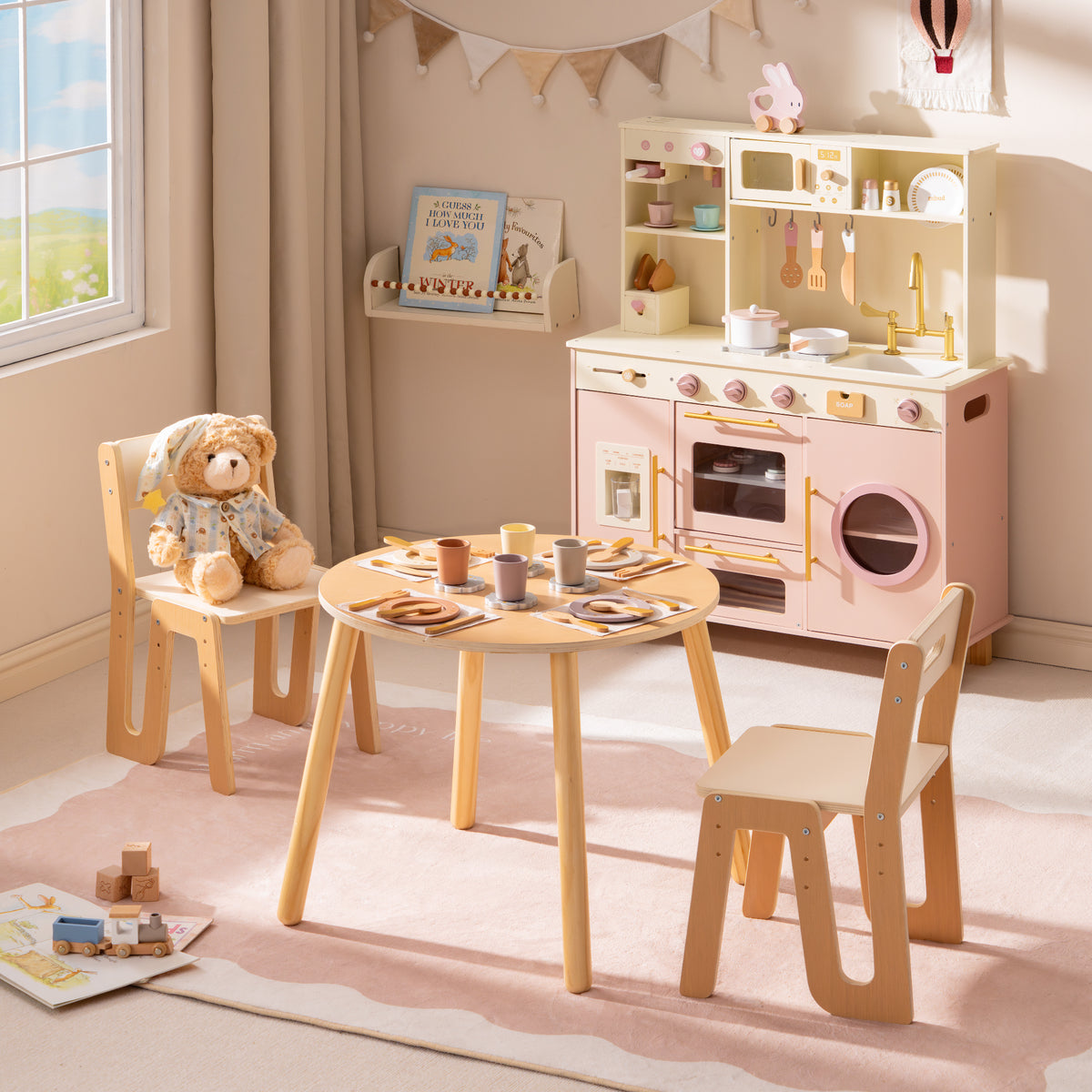 ROBUD Glowwood wooden table and chairs set with a pink play kitchen in natural light, showing the complete dining area.