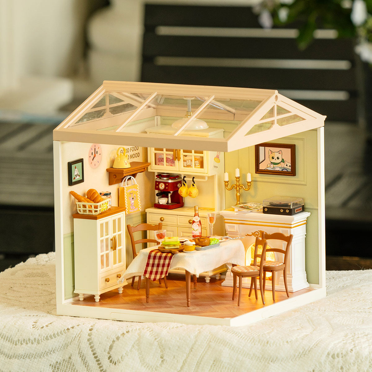 Rolife Warm Dining Room DW015B DIY miniature house showing a cozy kitchen with dining table, chairs and warm overhead lighting