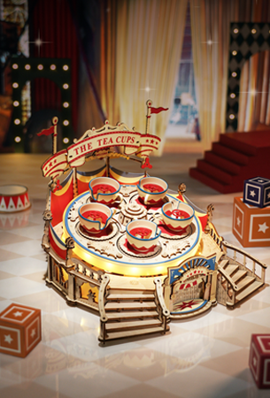 Robotime Magic Amusement Park collection theme graphic showing illuminated carousel ride model in festive stage setting