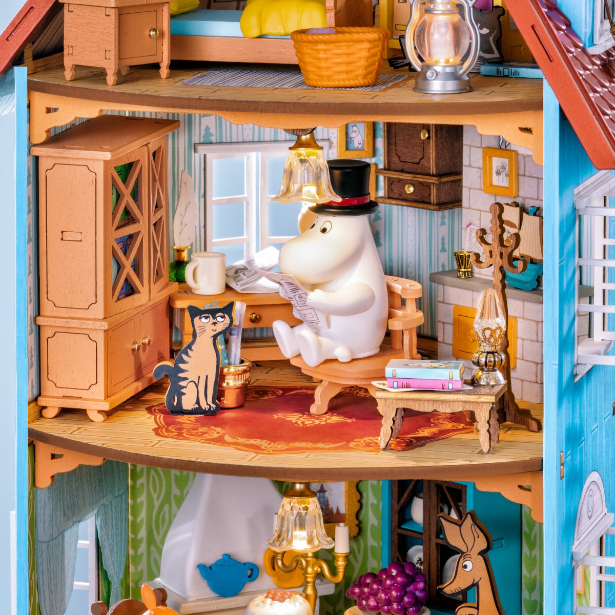 Rolife Moominhouse DIY miniature house study room close-up with Moominpappa and cat