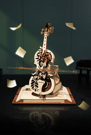 ROKR magic cello mechanical music box 3D wooden puzzle glowing under stage spotlights with sheet music pages floating in the background
