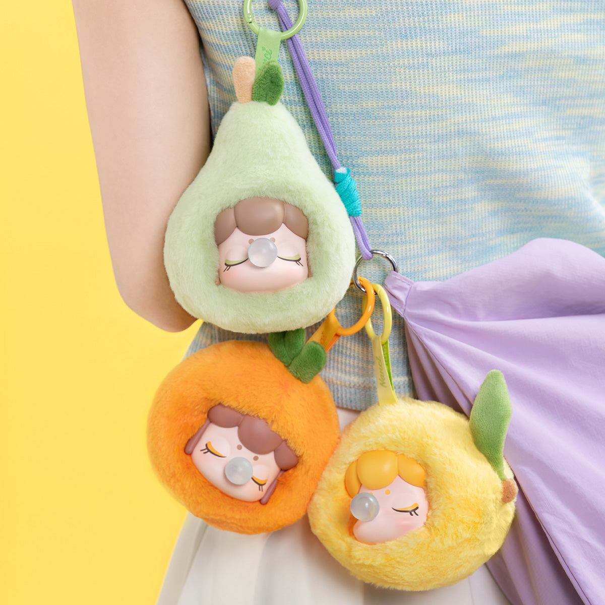 Rolife Nanci's Fruit Mood Surprise Plush Pendant MNCXX collectible figure, styled lifestyle scene with model assembled