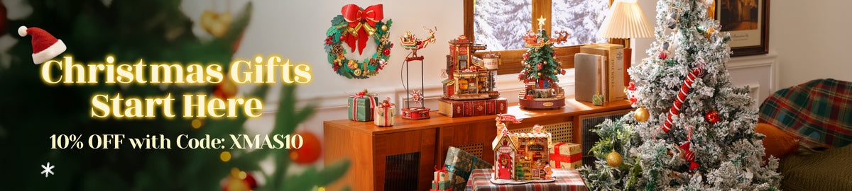 Robotime Christmas gifts promotional banner showing festive decorated room with tree and gifts in wide horizontal layout