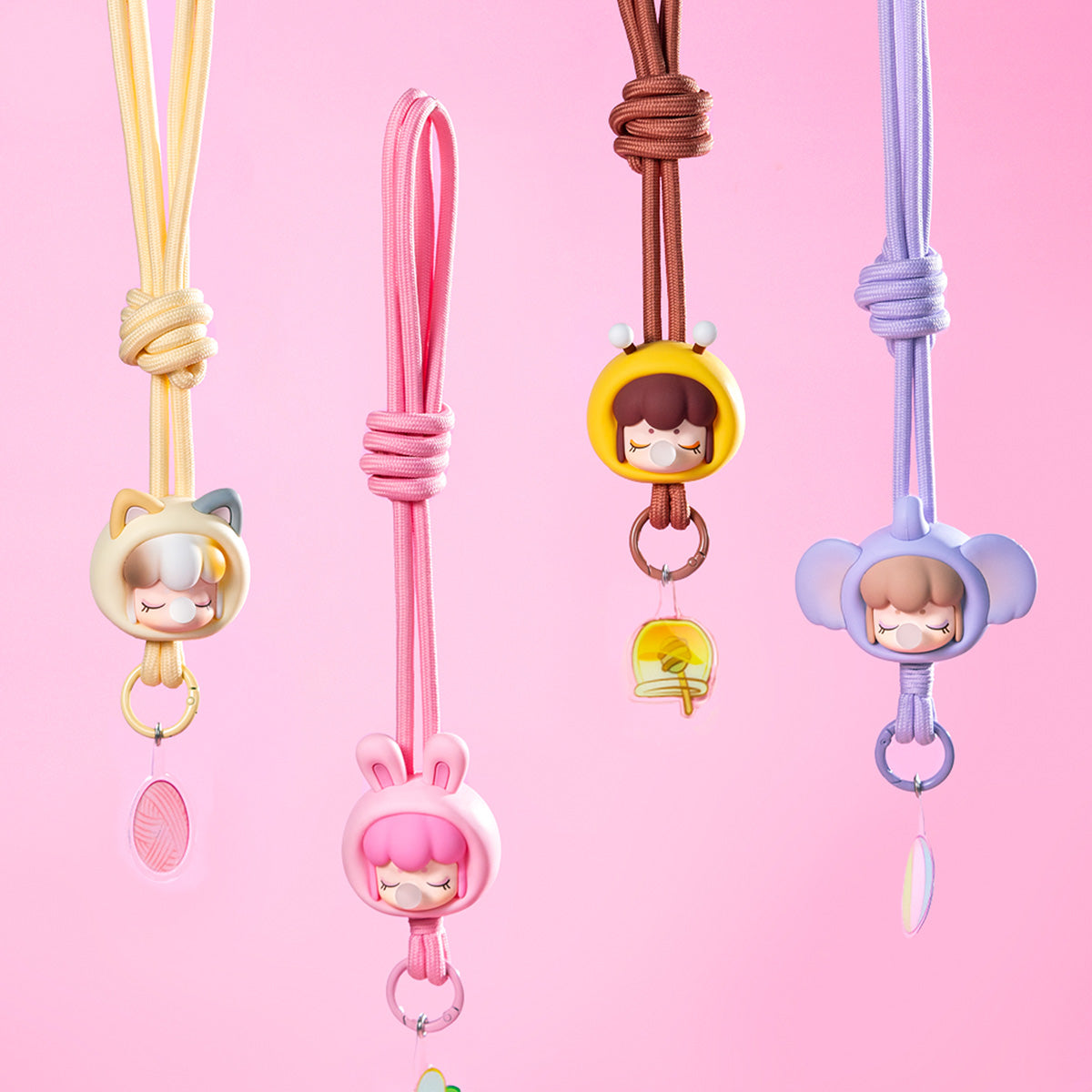 Rolife Baby Nanci Fluffy Party Phone Chain PZC05 Rabbit variant in pink on a pink lanyard cord worn as a phone strap