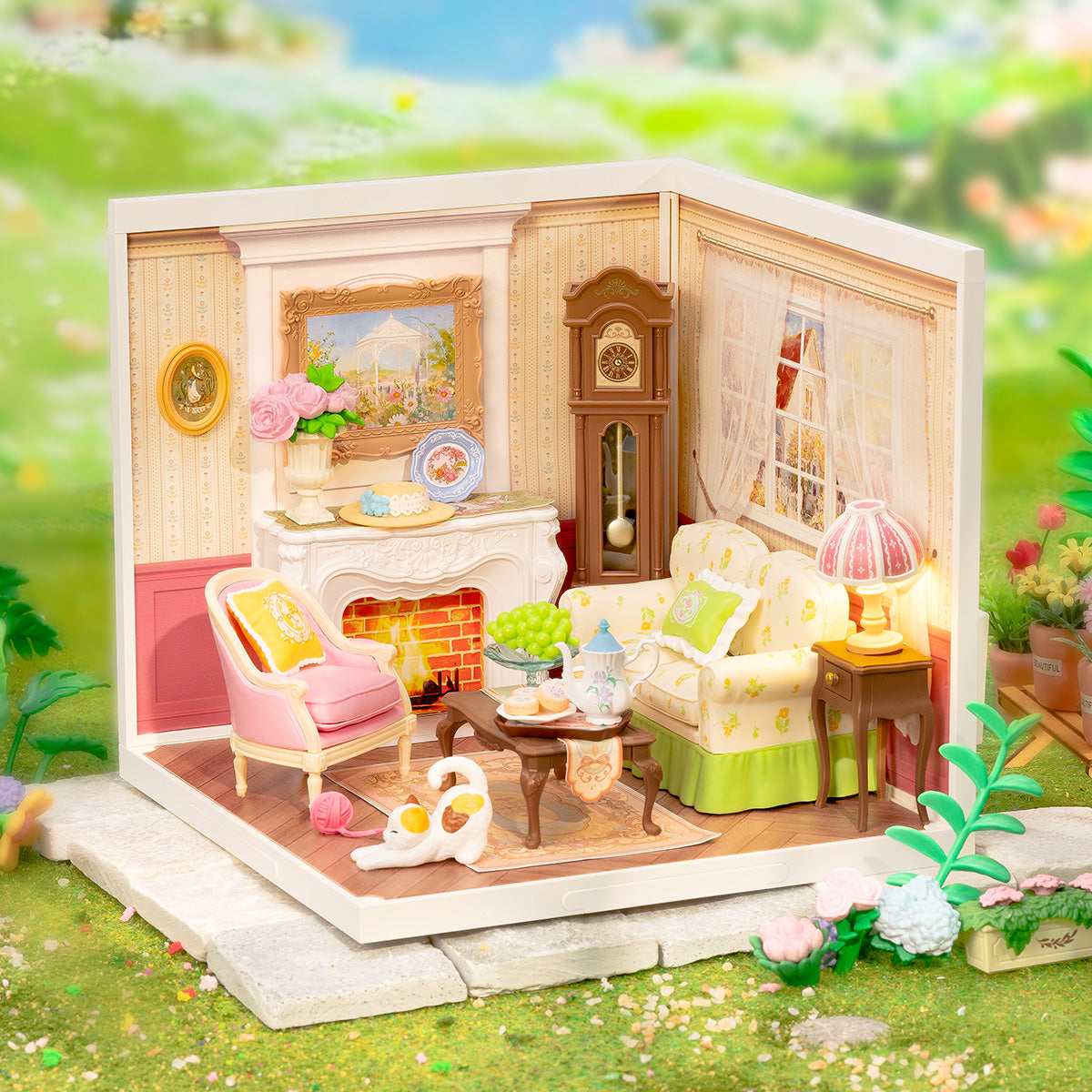 Rolife Holiday Tea Time DW023 complete open-corner living room scene with fireplace and armchairs in a sunny outdoor garden backdrop
