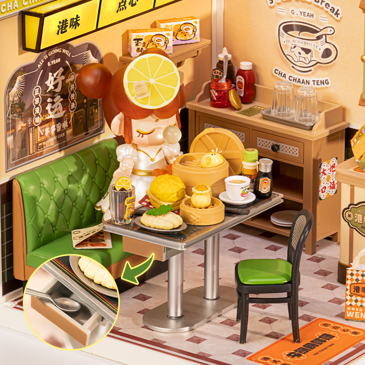 Rolife Hong Kong Bites Cafe DW021 interior detail showing the Suri lemon-head doll seated at a silver dining table with dim sum baskets, tea, and a hidden drawer callout