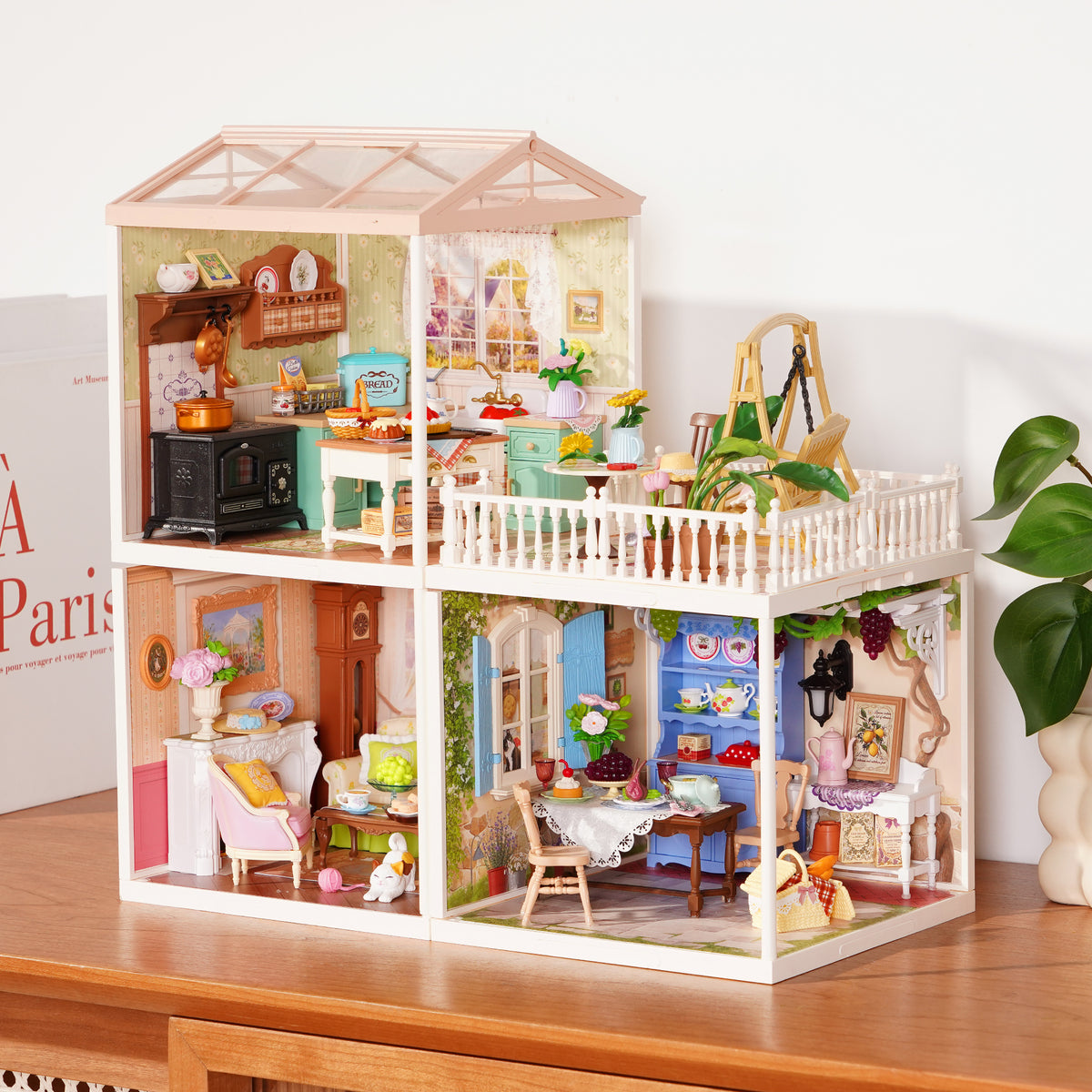 Rolife Romantic Countryside Super Creator L-shape front angle showing kitchen and living room levels with warm interior lighting