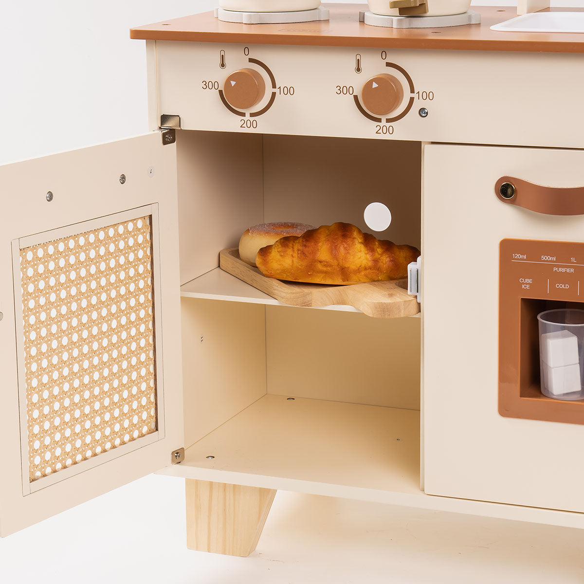 ROBUD Montessori kitchen close-up of open oven door showing interior shelf and a toy baked bread.