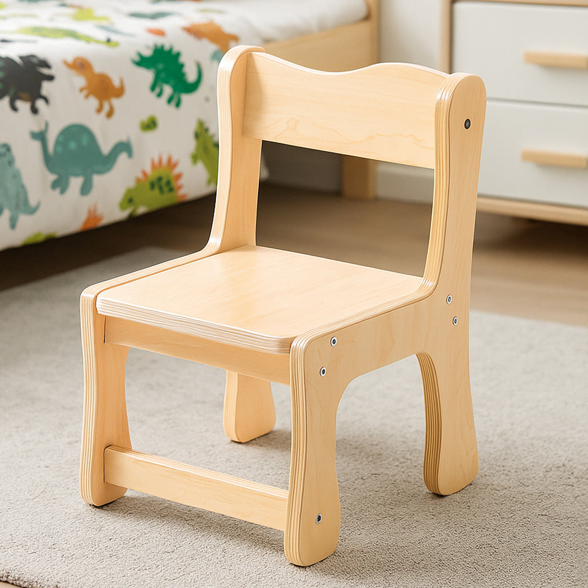 ROBUD natural birch wood kids chair with curved backrest and sturdy legs displayed on a bedroom rug.