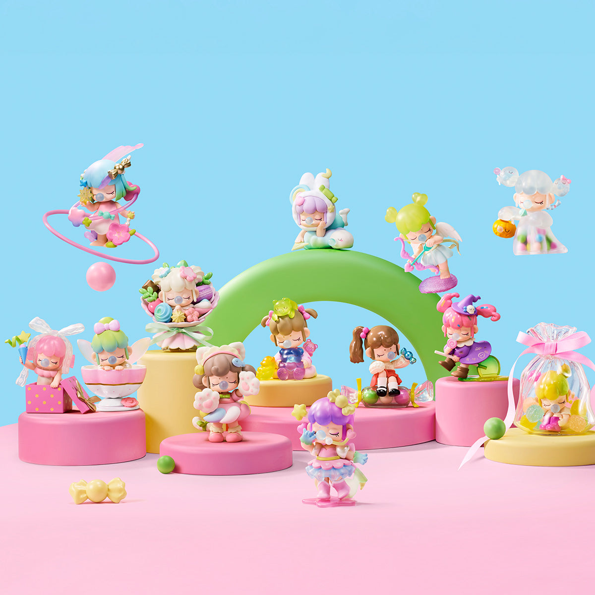 Rolife Nanci Sweet Time full series of twelve pastel collectible figure dolls arranged on tiered pink and yellow platforms against a blue background