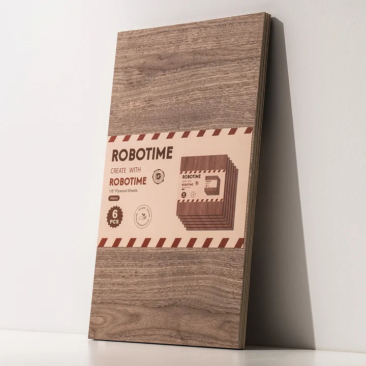 Robotime tall rectangular dark walnut plywood sheet with branded label at center right, standing upright against white wall