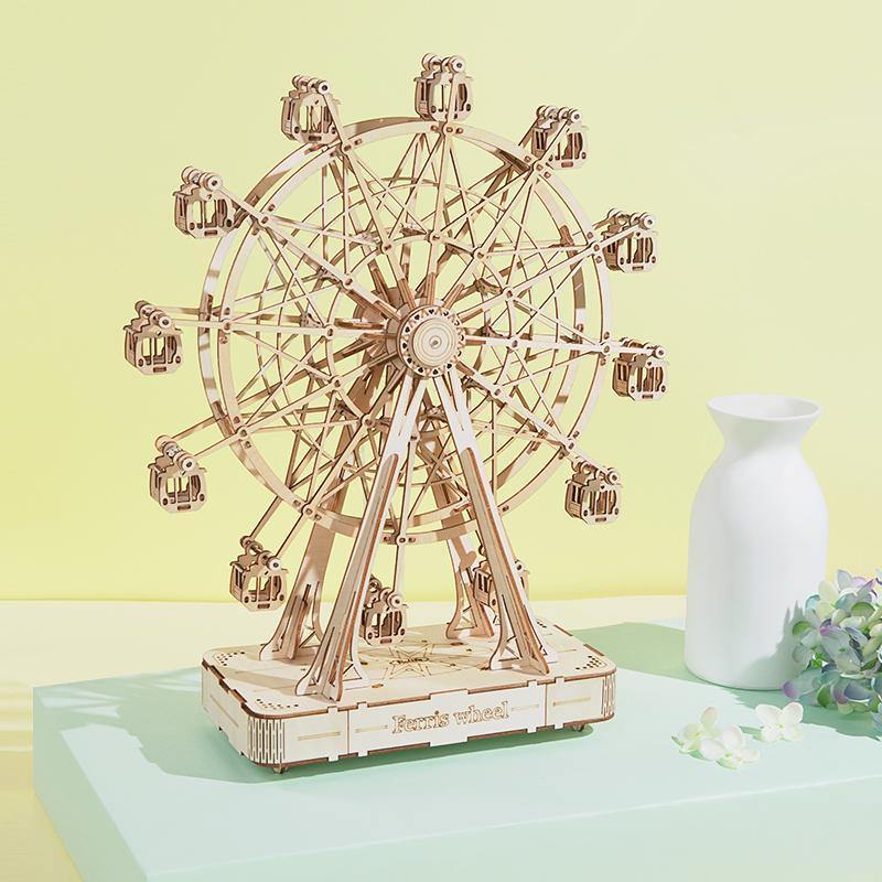 Rolife Ferris Wheel 3D wooden puzzle music box TGN01 hero shot on white background with natural wood finish and small vase