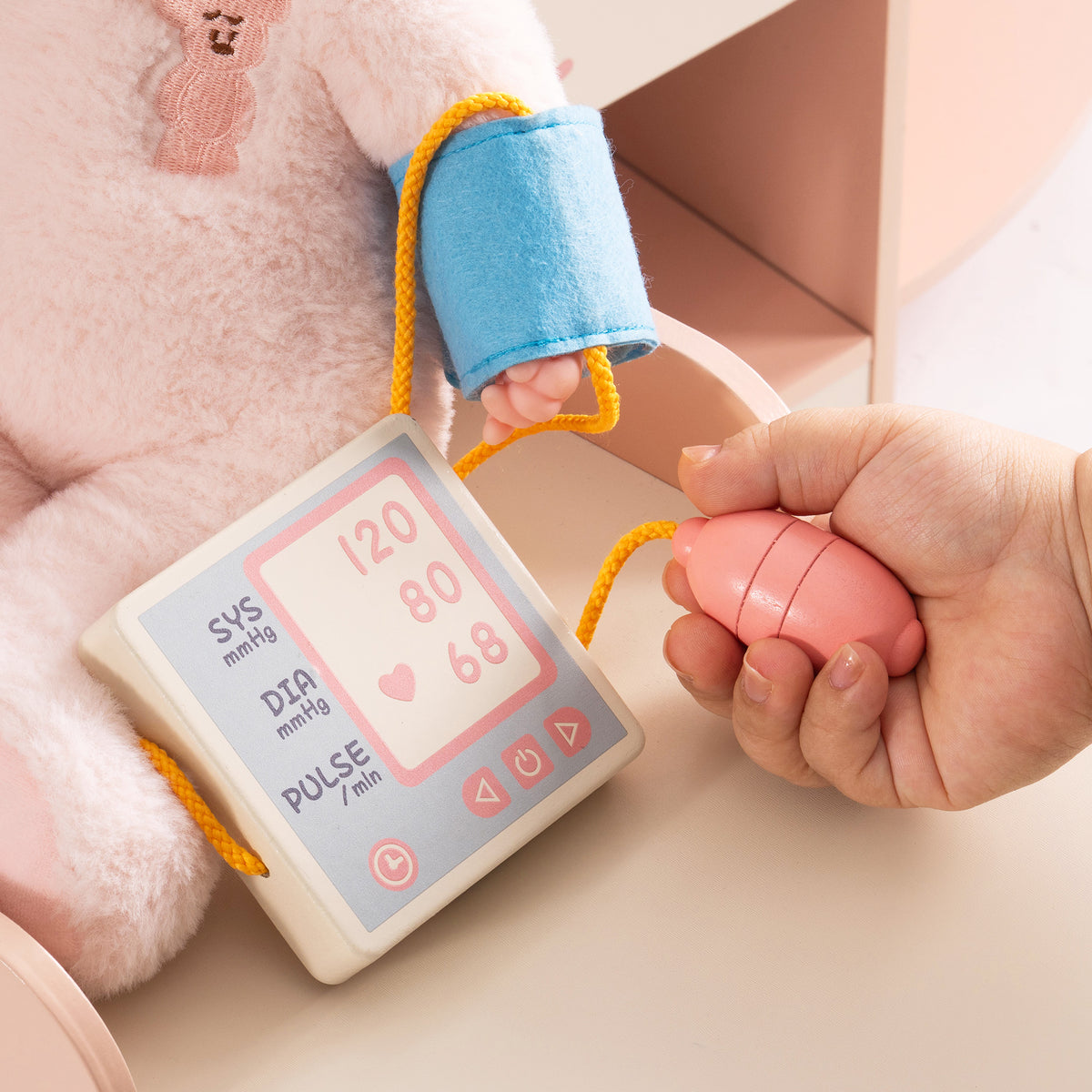 ROBUD wooden doctor activity set MRI scanner showing a baby doll sliding inside with a 360-degree rotating wheel detail callout