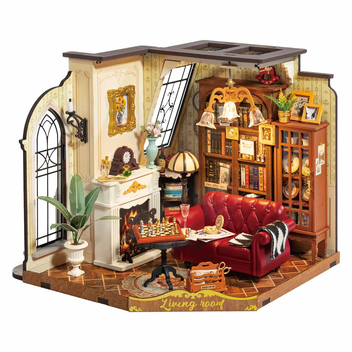 Rolife Catherine's Living Room DG175 DIY miniature house lit lifestyle shot on wooden table showing warm amber interior through the open front of the room box