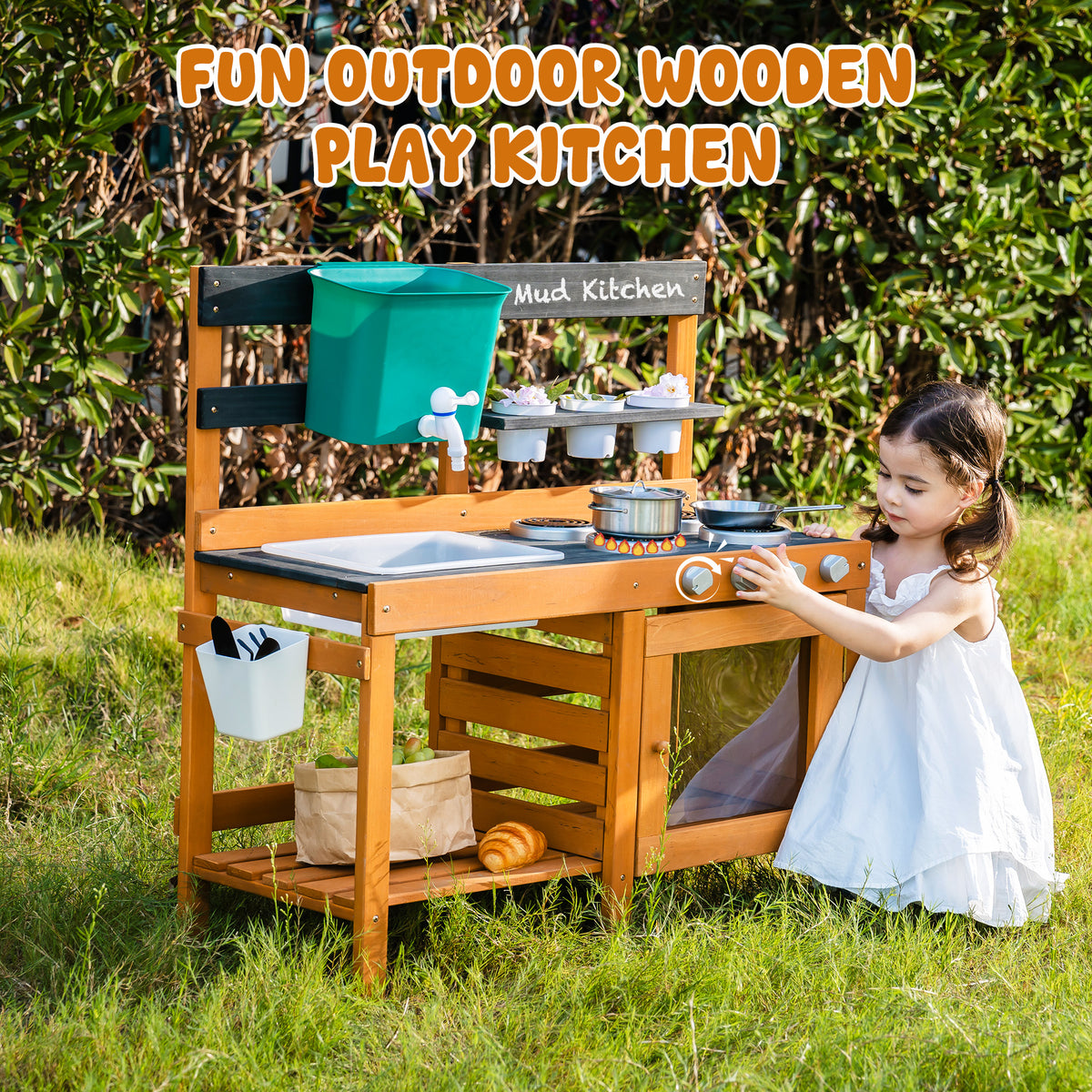 ROBUD Outdoor Mud Kitchen fun outdoor wooden play kitchen full view with girl wearing white dress playing beside it in grassy outdoor setting