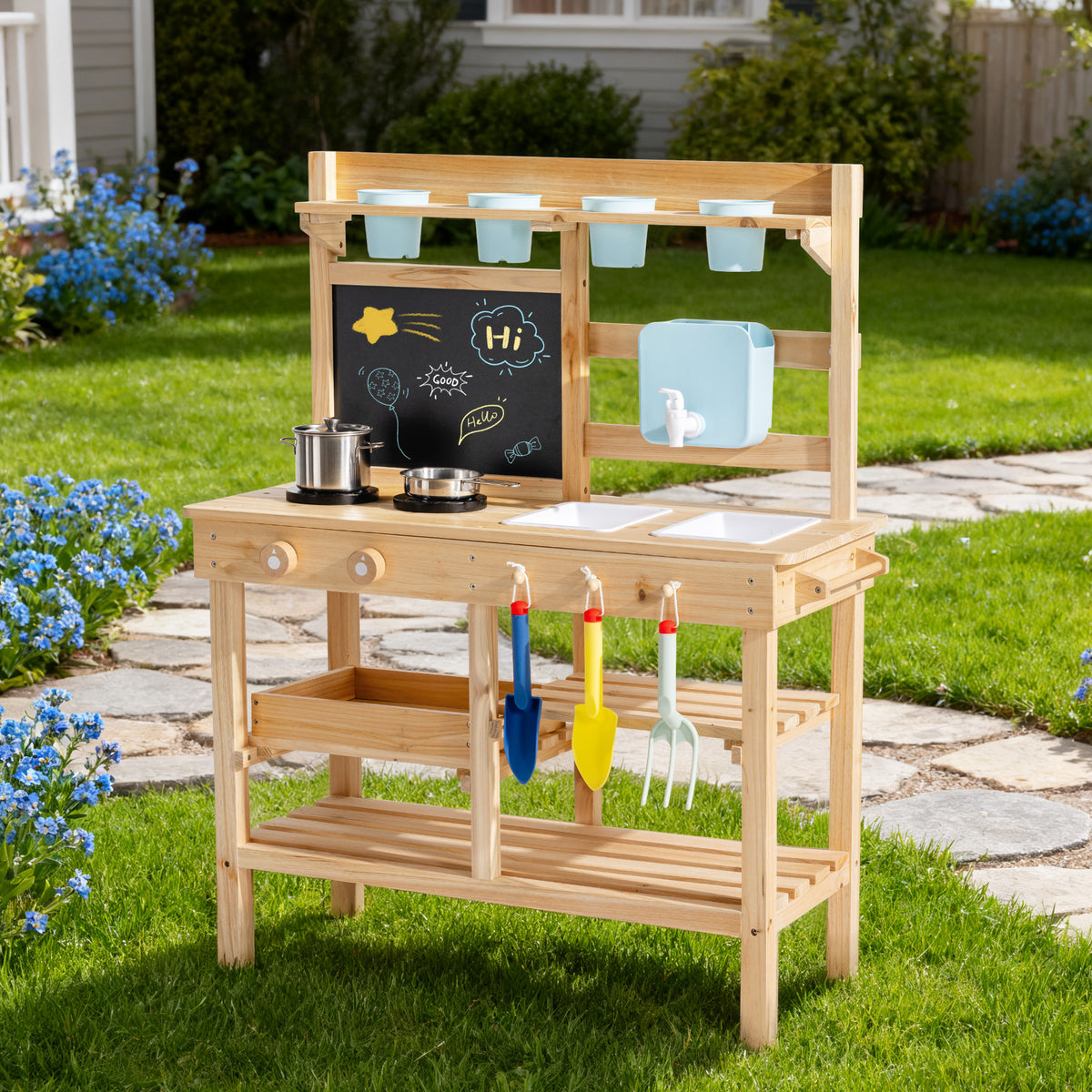 ROBUD Outdoor Garden Mud Kitchen hero front view of full natural wood outdoor kitchen station with chalkboard, blue watering can and utensil hooks in garden