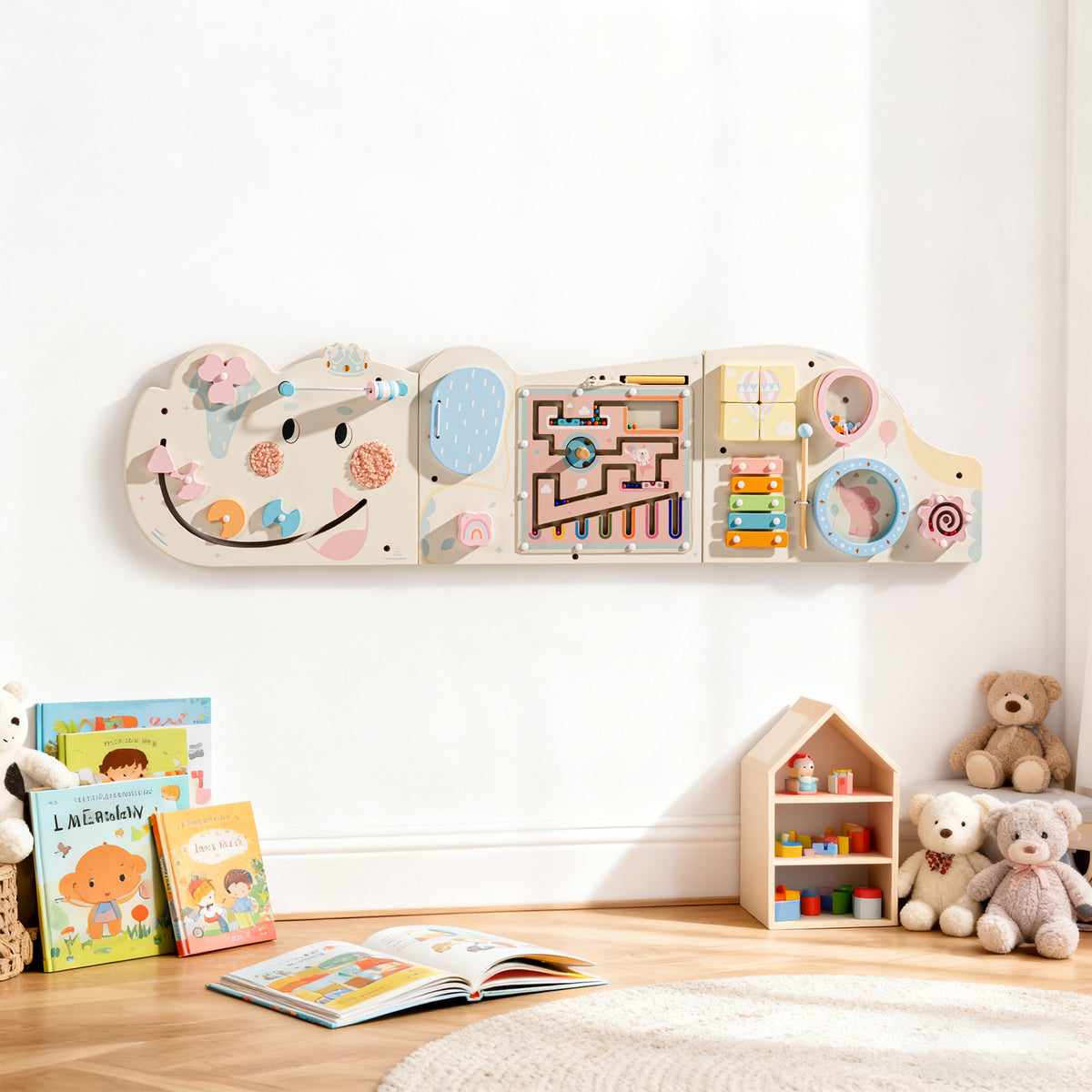 Two young children sitting on the floor playing with the ROBUD Wooden Cream Elephant Busy Board displayed across a white wall