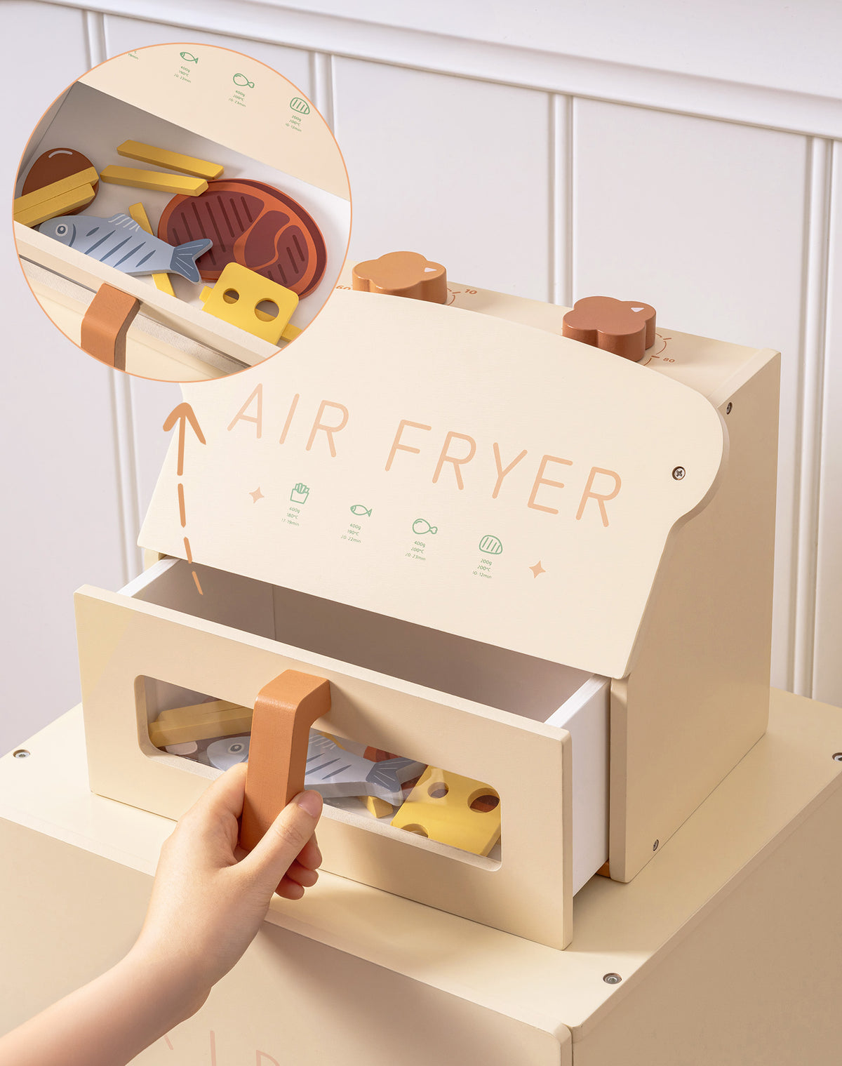 ROBUD creamy wooden play air fryer with lid open showing food accessories inside, close-up inset showing steak and cheese through the transparent oven window