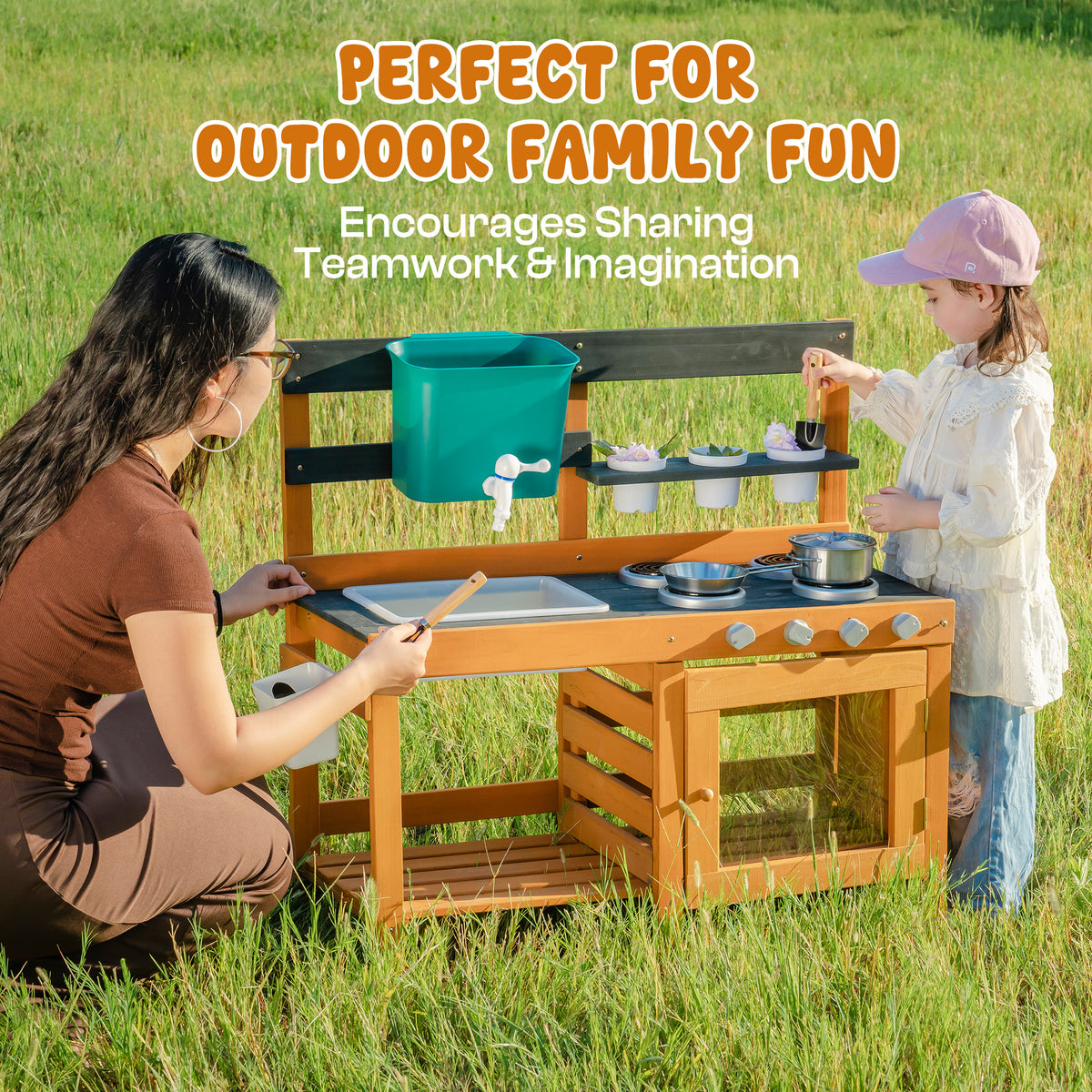 ROBUD Outdoor Mud Kitchen perfect for outdoor family fun view with mother and child using the honey wood outdoor play kitchen together in open field
