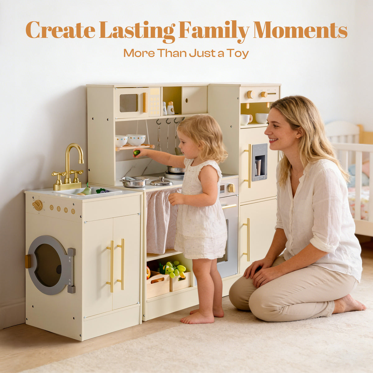 Mother kneeling beside her toddler daughter who plays at the ROBUD cream corner kitchen set in a bright living room.