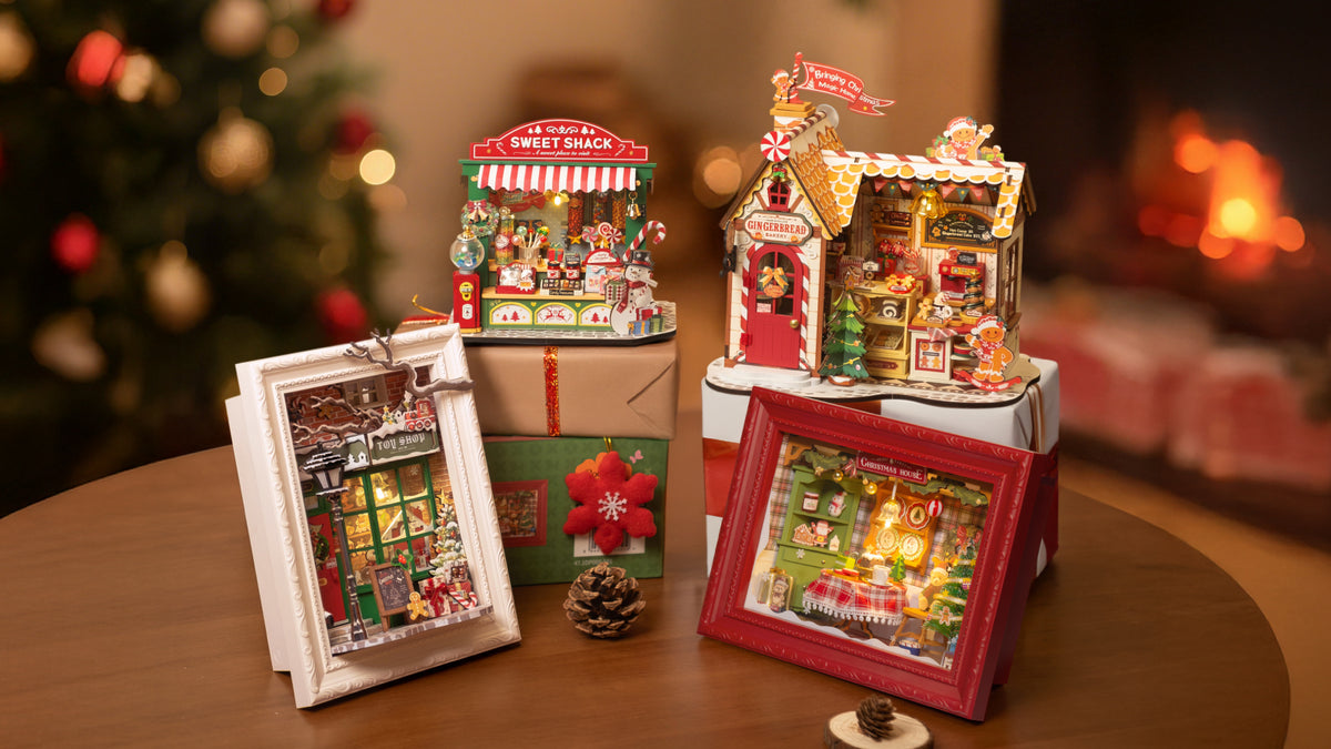Rolife Christmas Candy Stand DS043 lifestyle with Sweet Shack, Gingerbread house kit and book nooks near fireplace