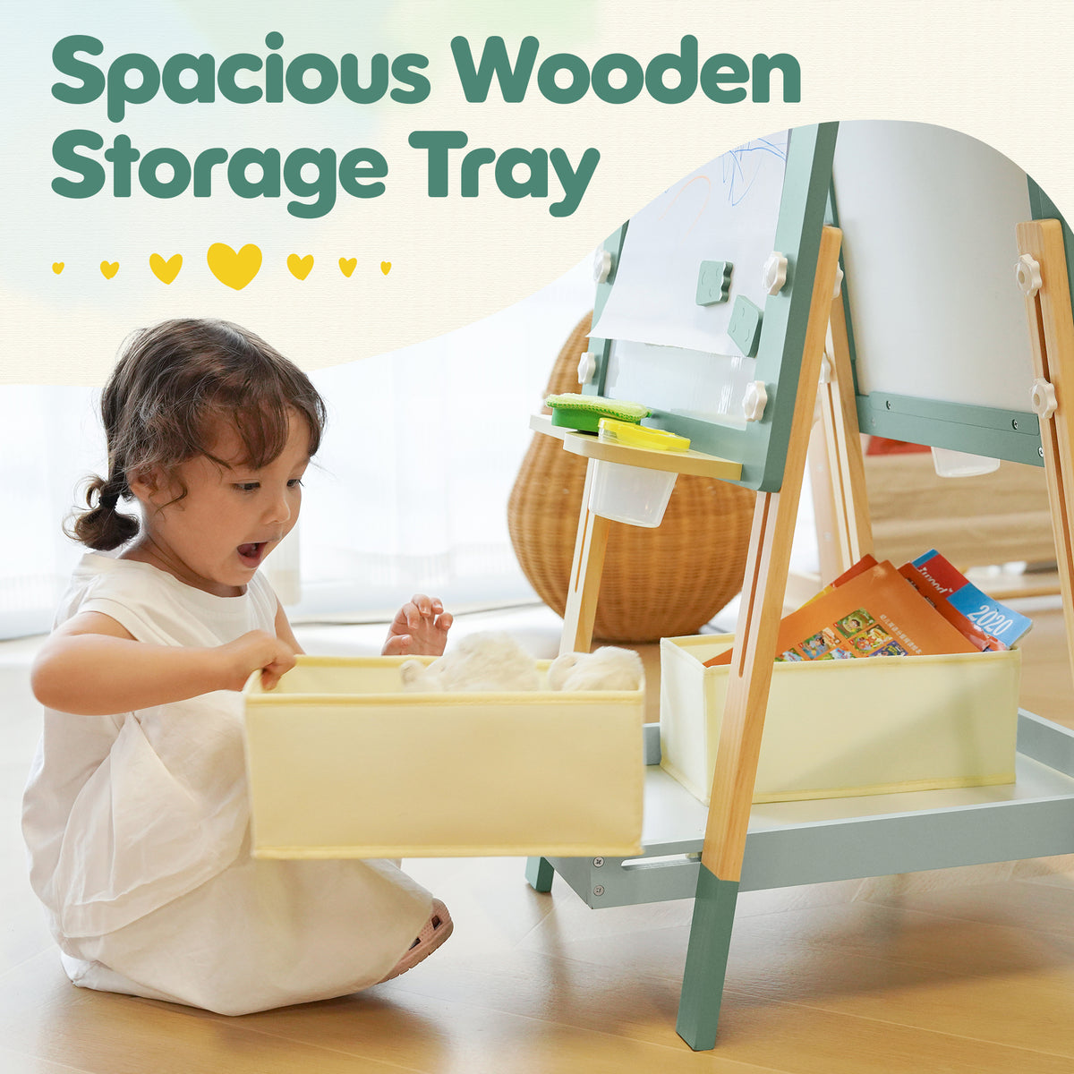Young girl using spacious wooden storage tray on ROBUD Crocodile Easel while seated on floor