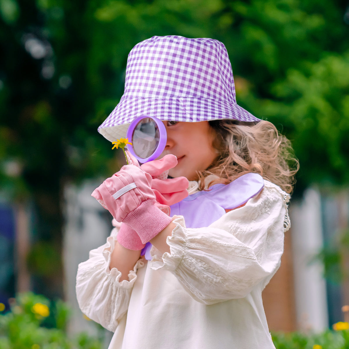 ROBUD Kids Gardening Set purple edition product flat lay showing tote bag, hat, apron, watering can, tools, gloves and pots on white