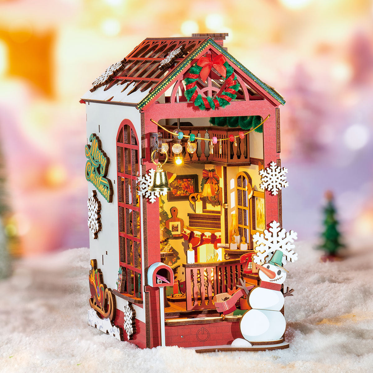 Rolife Christmas Indoor Scene book nook with red roof, snowman, and warm lights in snow.