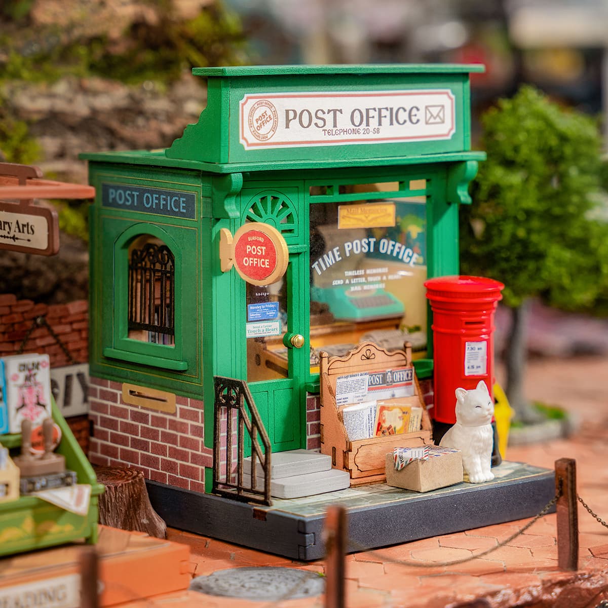 Rolife Century Post Office DS037 green miniature facade with red pillar post box, brick base and tiny parcel display outside