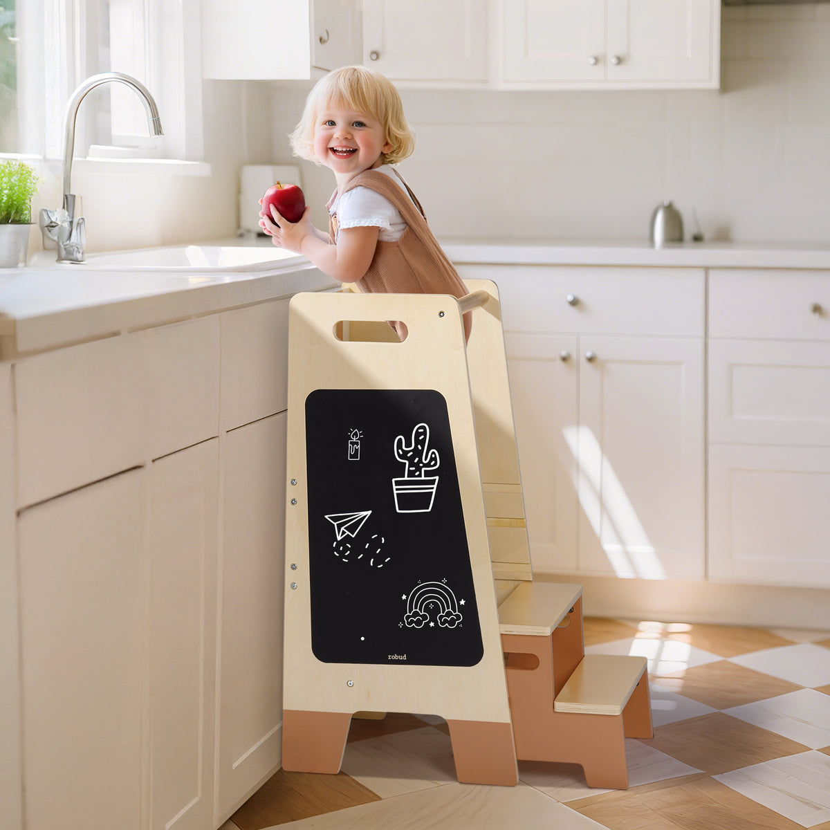 ROBUD Toddler Standing Tower with green accents showing adjustable height diagram and 50 kg weight capacity label on kitchen background