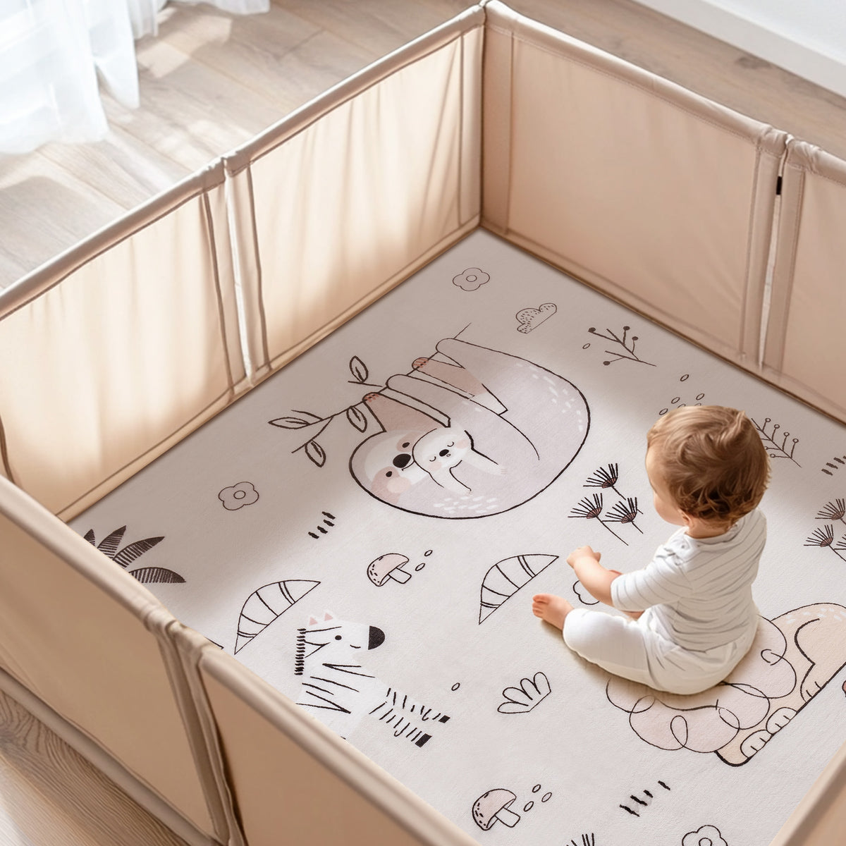 ROBUD baby play mat smiling toddler standing barefoot on the white safari-print foam mat in a bright modern living room with wooden shelving and plants in the background