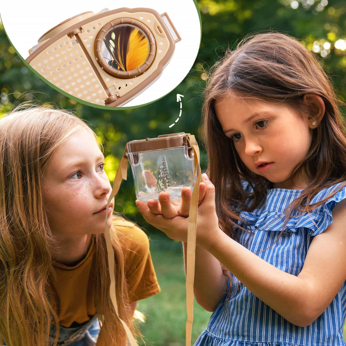 Two girls outdoors examining insects captured in a transparent ROBUD bug container held up to the light