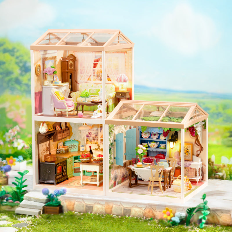 Rolife two story dollhouse miniature kit with a greenhouse skylight roof and kitchen furniture surrounded by grass