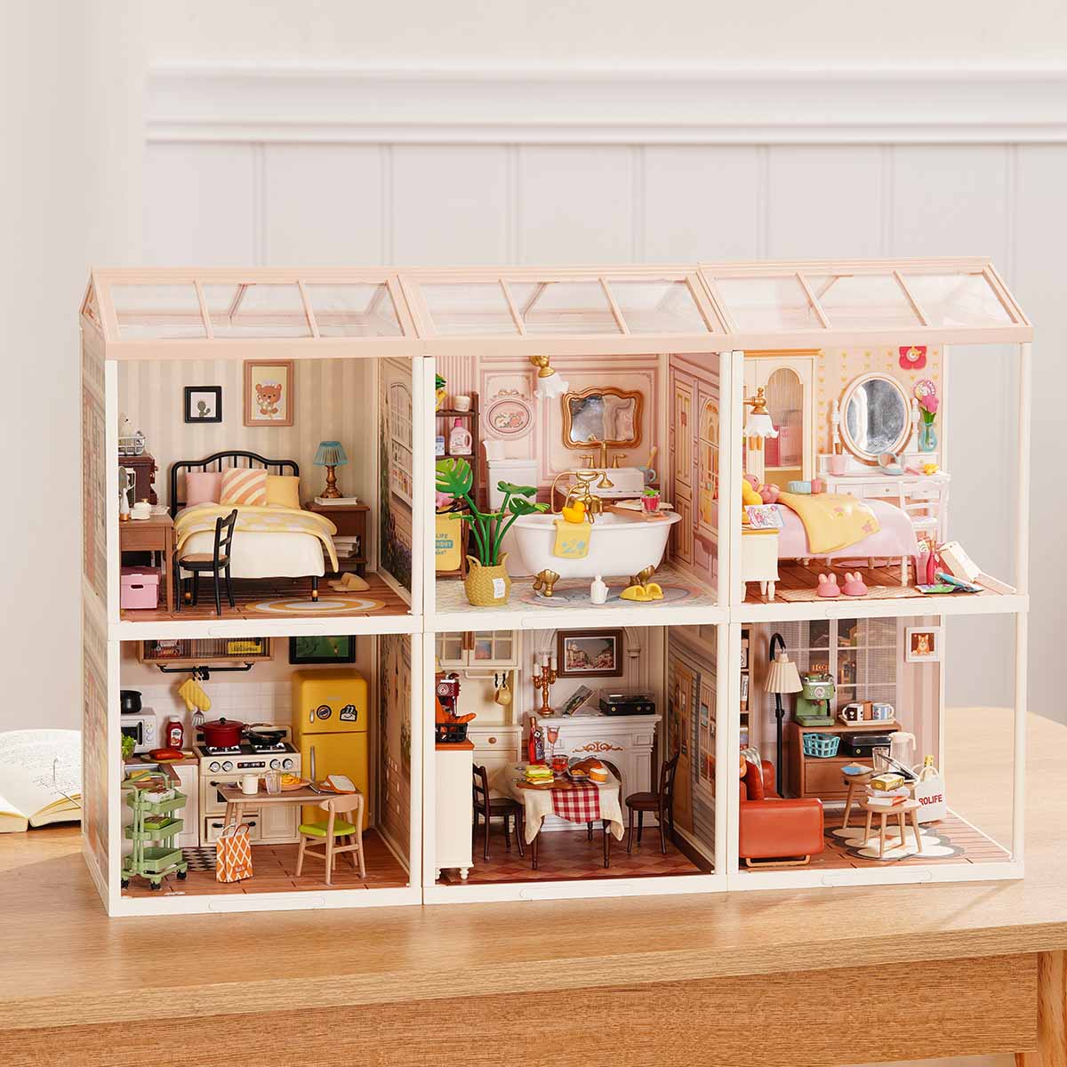 Rolife Super Creator Series 6-in-1 Six Grid miniature with six shop rooms including a cake bakery, ice cream shop, pink bedroom, living room, bathroom, and fresh flower shop in a wide grid.