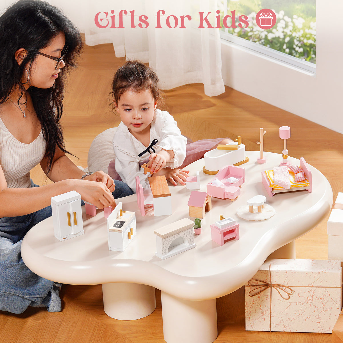Mother and child playing together at a low table with ROBUD Wooden Dollhouse Furniture Set Pink pieces spread across the surface