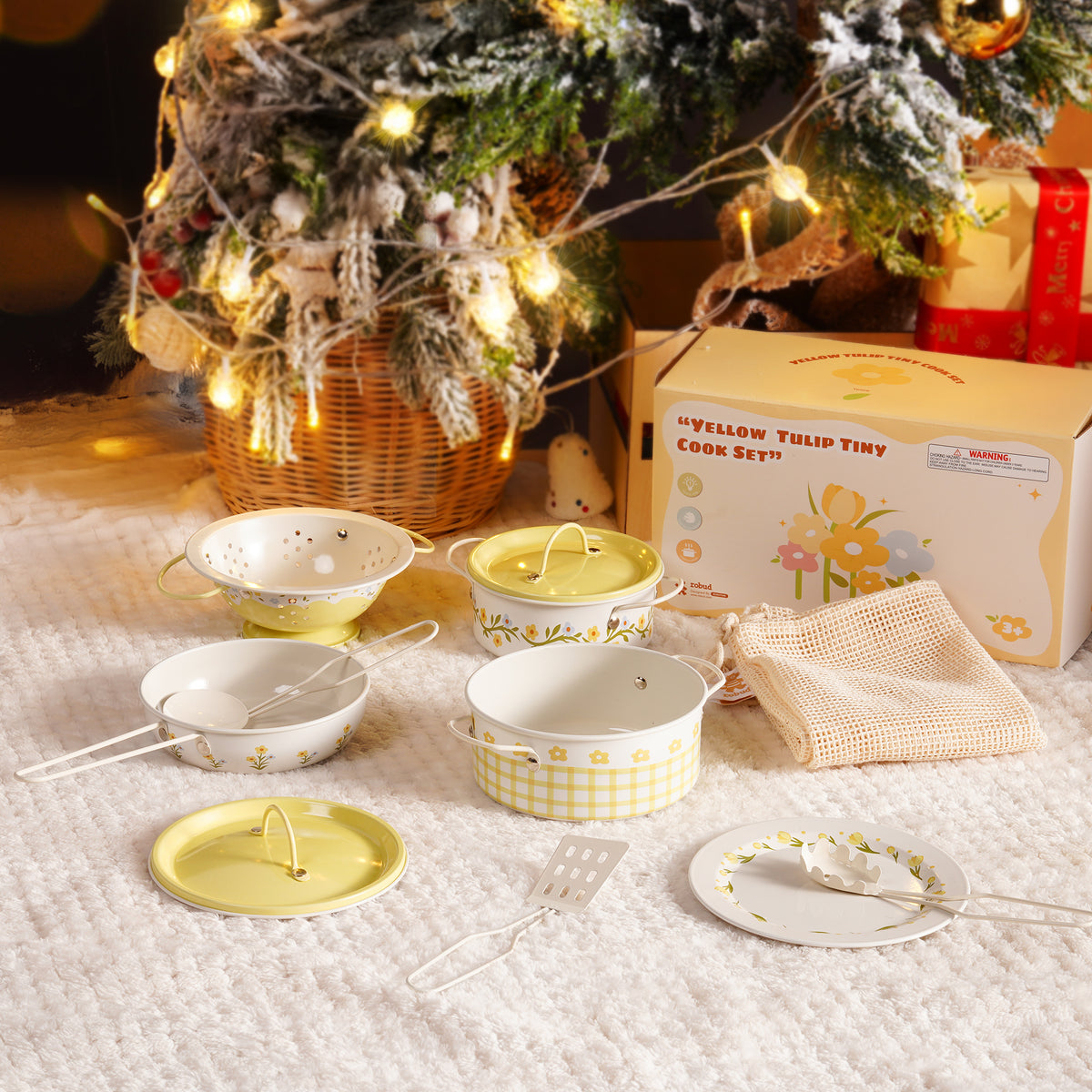Mother and toddler girl sitting together at low wooden table using ROBUD Tinplate Pretend Cooking Utensils cream series cookware set