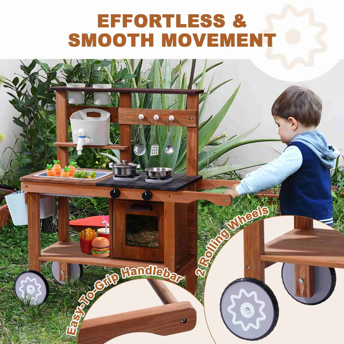 ROBUD outdoor mud kitchen effortless movement feature showing a boy pushing the wheeled kitchen across a garden path
