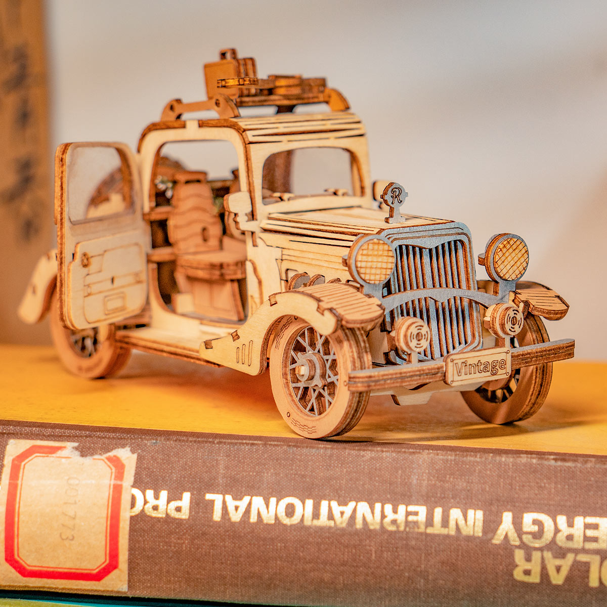 Rolife Vintage Car 3D wooden puzzle TG504 side profile showing full car silhouette with spoked wheels and open-top body style
