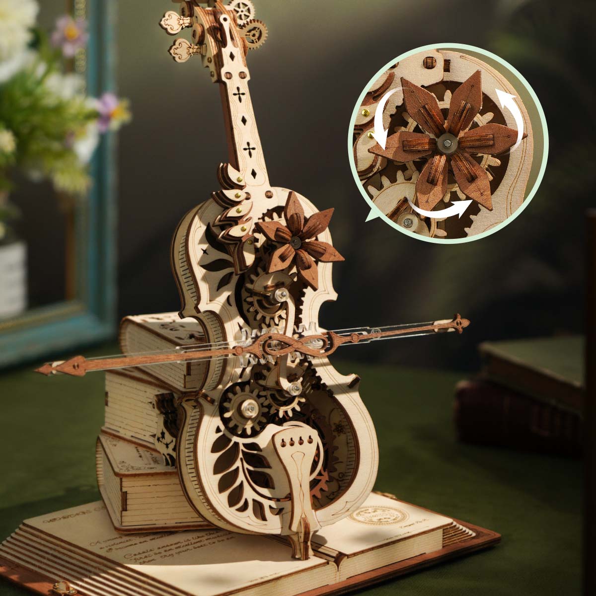ROKR Magic Cello AMK63 close up showing the spinning wooden flower petal mechanism with detail callout circle highlighting gear rotation