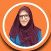 Ayesha Atif blog author portrait in circular frame on orange background
